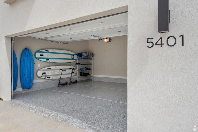 5401 S Aquamarine Ln E, St George, UT 84790 - garage featuring a garage door opener
