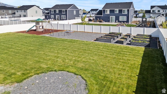 763 E 1200 S, Hyrum, UT 84319 - view of yard featuring a residential view, a garden, and a playground