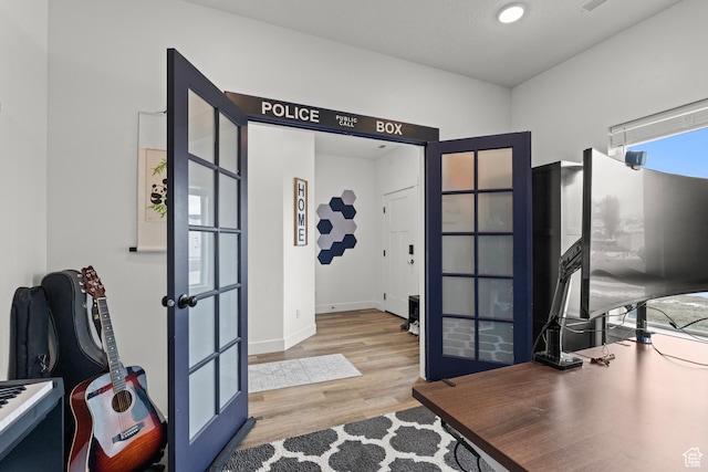 763 E 1200 S, Hyrum, UT 84319 - home office featuring wood finished floors, baseboards, and french doors