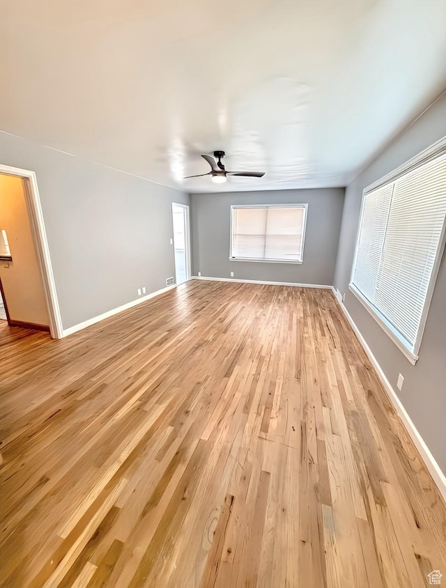175 E 700 N, Logan, UT 84321 - interior space with light wood finished floors, baseboards, and a ceiling fan