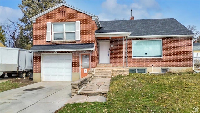 175 E 700 N, Logan, UT 84321 - view of front of home featuring driveway, a chimney, a shingled roof, a garage, and brick siding
