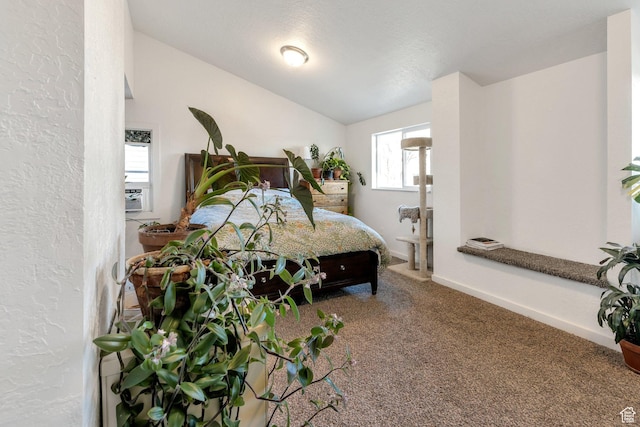 661 E 2735 S, Ogden, UT 84403 - carpeted bedroom featuring lofted ceiling, cooling unit, a textured wall, and baseboards