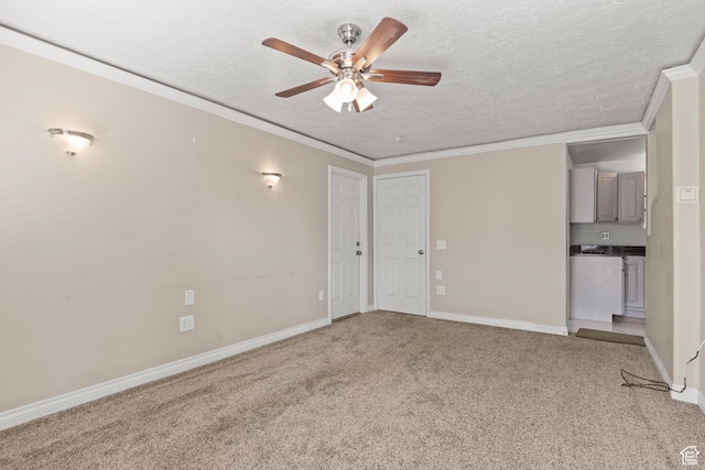 661 E 2735 S, Ogden, UT 84403 - unfurnished living room featuring a ceiling fan, light carpet, ornamental molding, and a textured ceiling