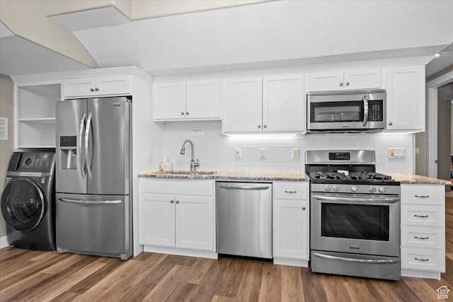 1336 S 2650 E, Springville, UT 84663 - kitchen with a sink, dark wood finished floors, appliances with stainless steel finishes, light stone countertops, and washer / dryer