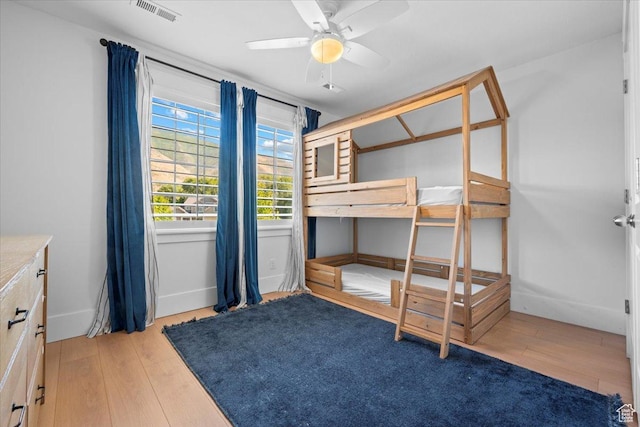 1336 S 2650 E, Springville, UT 84663 - bedroom with visible vents, a ceiling fan, baseboards, and wood finished floors