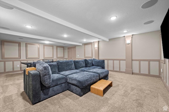 1336 S 2650 E, Springville, UT 84663 - living area featuring beam ceiling, a textured ceiling, recessed lighting, a decorative wall, and light colored carpet