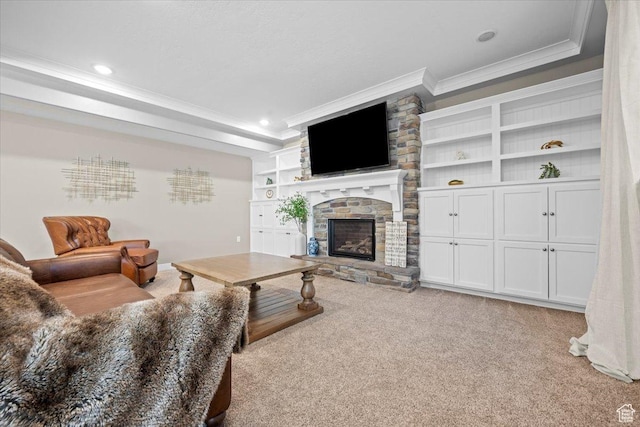 1336 S 2650 E, Springville, UT 84663 - living area featuring ornamental molding, a tray ceiling, recessed lighting, a stone fireplace, and carpet flooring