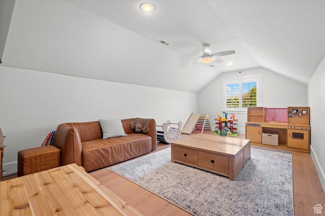 1336 S 2650 E, Springville, UT 84663 - living room with visible vents, lofted ceiling, light wood-style floors, and a ceiling fan