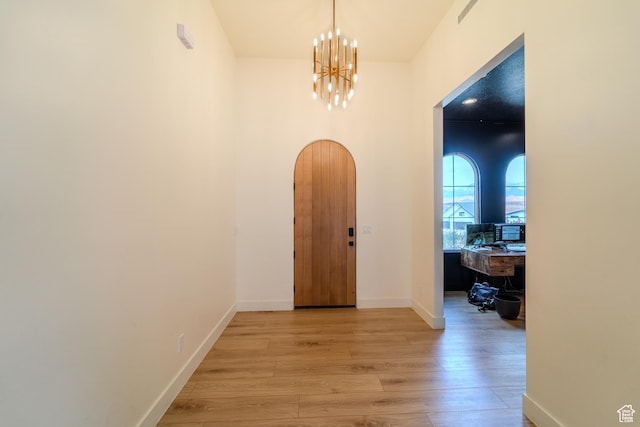 1683 S Painted Vista Cir, Washington, UT 84780 - entryway featuring a notable chandelier, light wood-style flooring, and baseboards