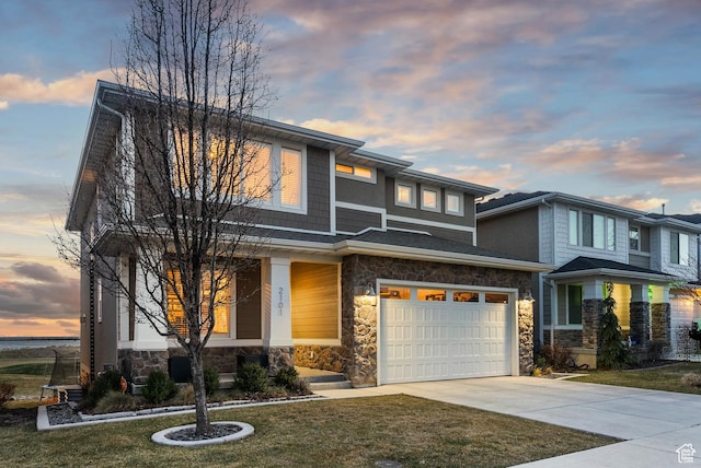 2101 W 980 S, Orem, UT 84059 - view of front of property with a garage, stone siding, a yard, and driveway