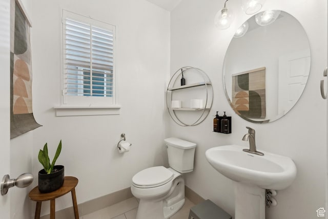 2101 W 980 S, Orem, UT 84059 - bathroom featuring tile patterned flooring, toilet, baseboards, and a sink