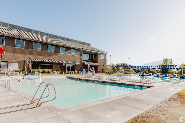 pool with a patio area
