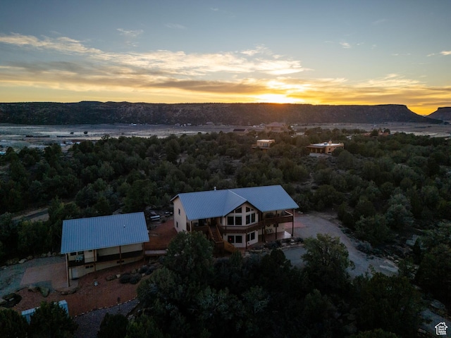 1617 N Mount Zion Dr, Apple Valley, UT 84737 - drone / aerial view with a wooded view and a mountain view