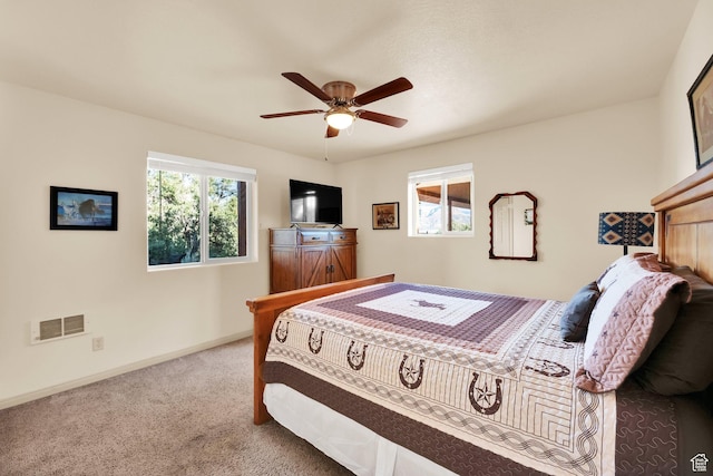 1617 N Mount Zion Dr, Apple Valley, UT 84737 - carpeted bedroom featuring a ceiling fan, baseboards, multiple windows, and visible vents