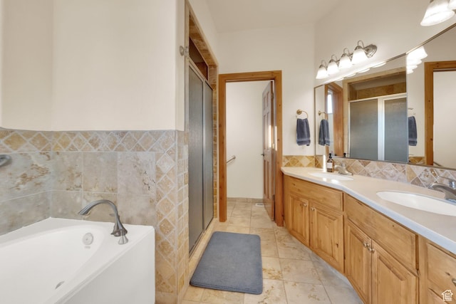 1617 N Mount Zion Dr, Apple Valley, UT 84737 - bathroom featuring tile patterned flooring, a sink, a stall shower, and a garden tub