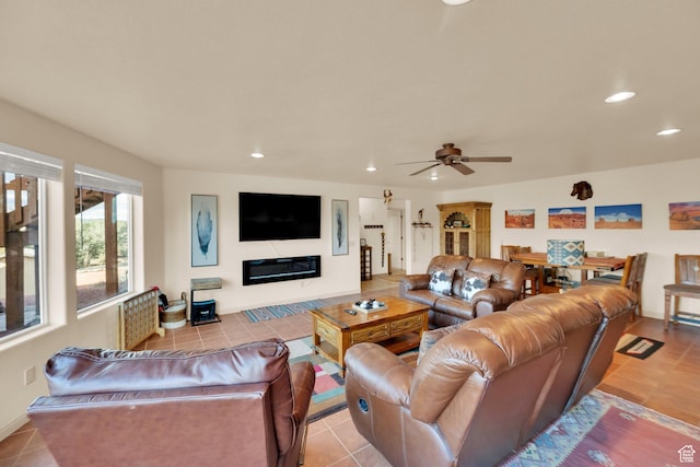 1617 N Mount Zion Dr, Apple Valley, UT 84737 - tiled living room with a glass covered fireplace, recessed lighting, and a ceiling fan