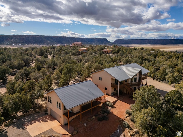 1617 N Mount Zion Dr, Apple Valley, UT 84737 - drone / aerial view with a wooded view and a mountain view