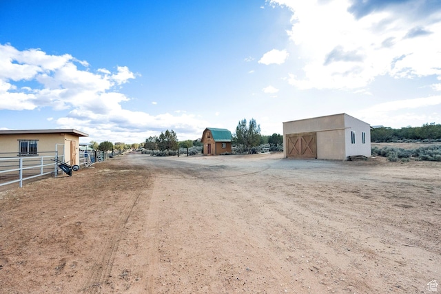 1617 N Mount Zion Dr, Apple Valley, UT 84737 - view of street featuring a barn and a rural view