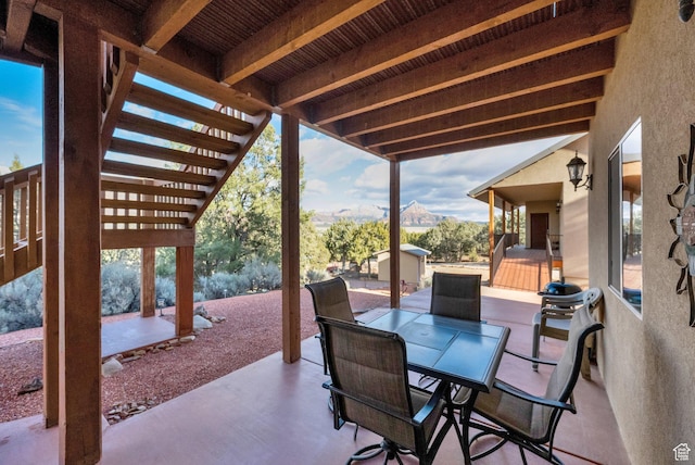 1617 N Mount Zion Dr, Apple Valley, UT 84737 - view of patio / terrace featuring a pergola, outdoor dining area, and an outbuilding