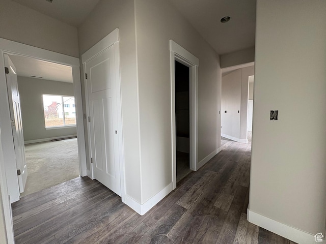 2861 N 3475 W Unit 15, Plain City, UT 84404 - hall with dark wood-type flooring and baseboards