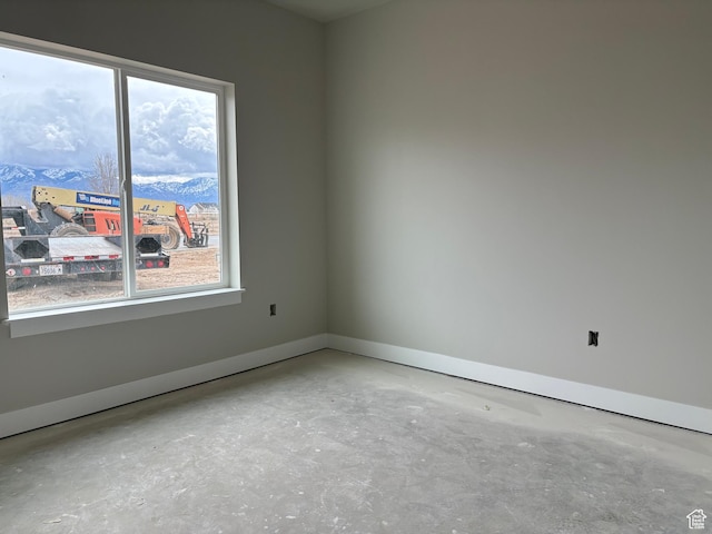 2861 N 3475 W Unit 15, Plain City, UT 84404 - spare room with baseboards, plenty of natural light, and unfinished concrete floors