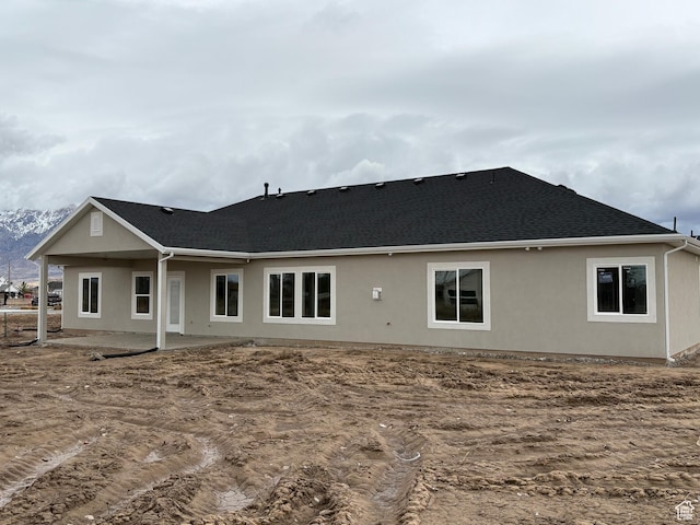 2861 N 3475 W Unit 15, Plain City, UT 84404 - rear view of property with a patio area, a shingled roof, and stucco siding