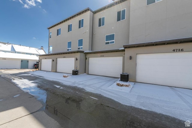 4712 W S Jordan Pkwy S, South Jordan, UT 84009 - exterior space featuring stucco siding and cooling unit