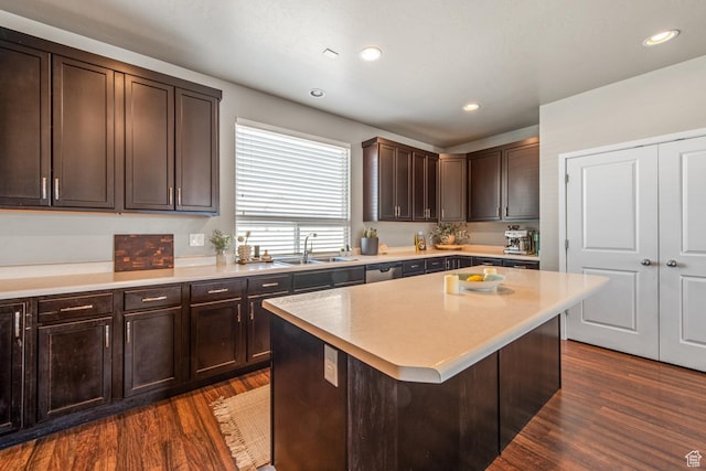 4712 W S Jordan Pkwy S, South Jordan, UT 84009 - kitchen with dark brown cabinetry, light countertops, dark wood-type flooring, and a sink