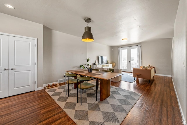 4712 W S Jordan Pkwy S, South Jordan, UT 84009 - dining room featuring wood finished floors, french doors, baseboards, and visible vents