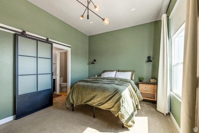 4712 W S Jordan Pkwy S, South Jordan, UT 84009 - bedroom with a barn door, carpet, and baseboards