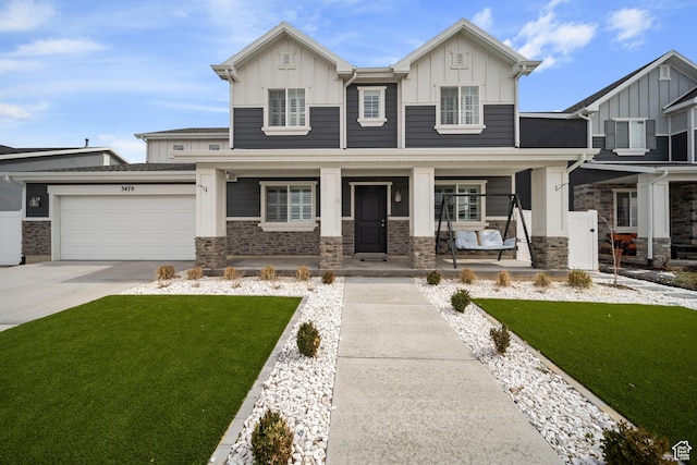 view of front facade featuring a porch, stone siding, board and batten siding, and concrete driveway