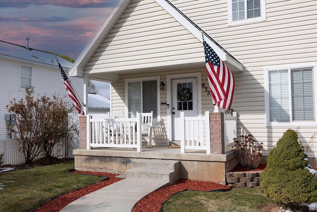832 S 1430 E, Spanish Fork, UT 84660 - exterior entry at dusk featuring covered porch