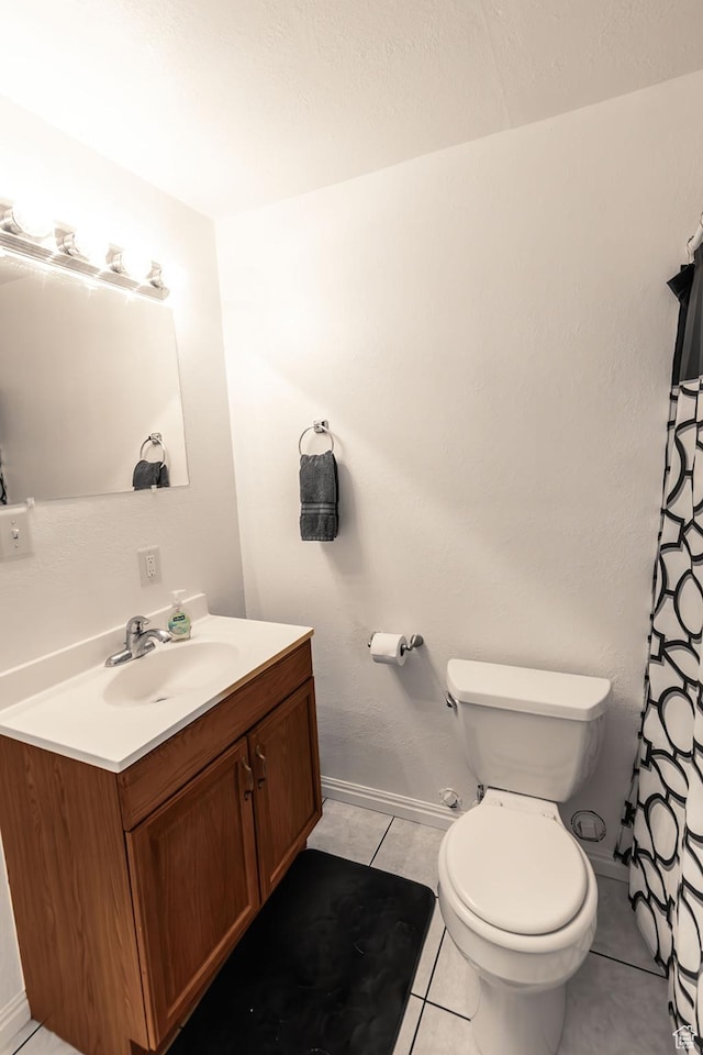 832 S 1430 E, Spanish Fork, UT 84660 - bathroom featuring vanity, toilet, tile patterned flooring, baseboards, and a shower with shower curtain