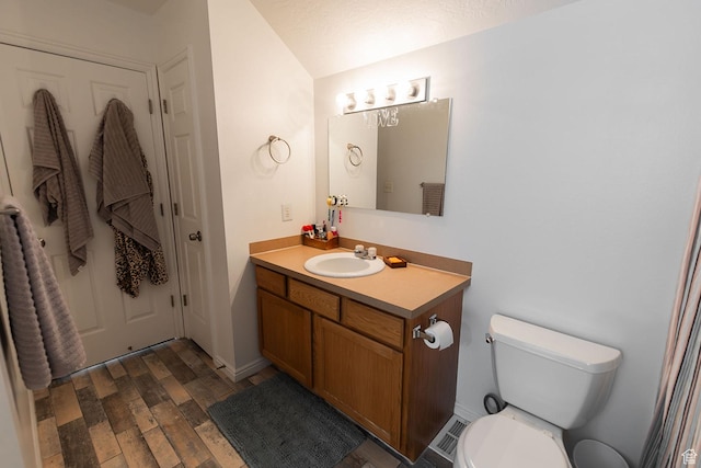 832 S 1430 E, Spanish Fork, UT 84660 - bathroom with vanity, wood finished floors, and toilet