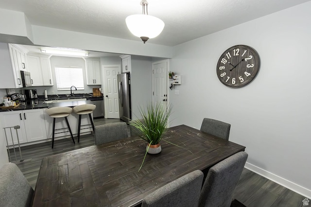 832 S 1430 E, Spanish Fork, UT 84660 - dining space with dark wood-style flooring and baseboards
