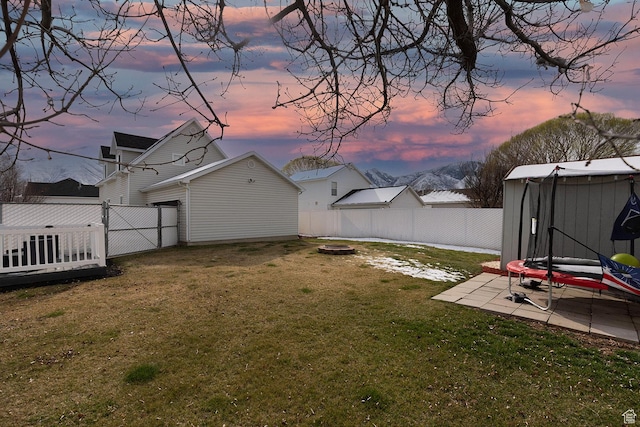 832 S 1430 E, Spanish Fork, UT 84660 - view of yard featuring a fire pit, a trampoline, and a patio