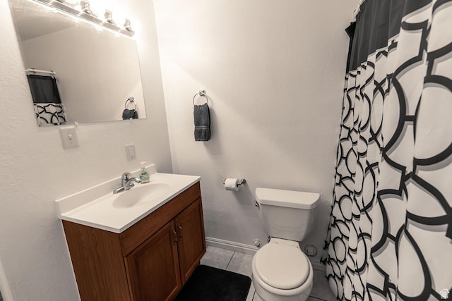 832 S 1430 E, Spanish Fork, UT 84660 - full bath featuring vanity, toilet, baseboards, tile patterned flooring, and curtained shower