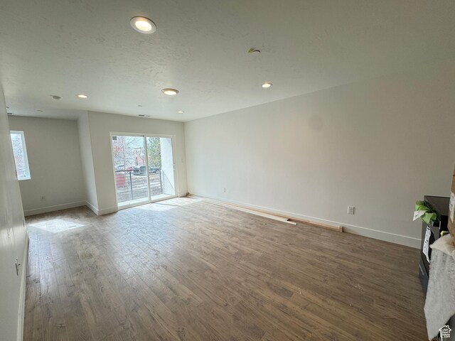 1590 S 900 W Unit 902, Salt Lake City, UT 84104 - spare room with baseboards, wood finished floors, and recessed lighting