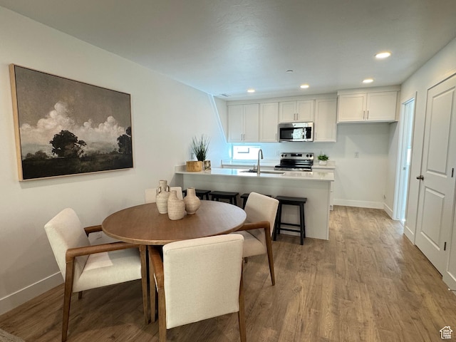 1590 S 900 W Unit 902, Salt Lake City, UT 84104 - dining room with recessed lighting, baseboards, and light wood-type flooring
