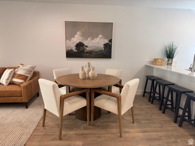 1590 S 900 W Unit 902, Salt Lake City, UT 84104 - dining area with baseboards and wood finished floors