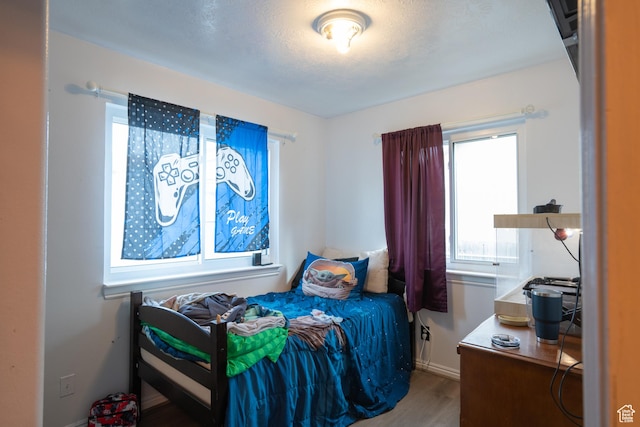 4072 N White Pine Rd E, Eagle Mountain, UT 84005 - bedroom featuring wood finished floors