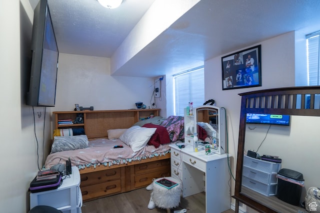 4072 N White Pine Rd E, Eagle Mountain, UT 84005 - bedroom with multiple windows and wood finished floors