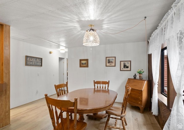 1372 S Cottonwood Ln, Hatch, UT 84735 - dining area featuring an inviting chandelier and light wood-style flooring