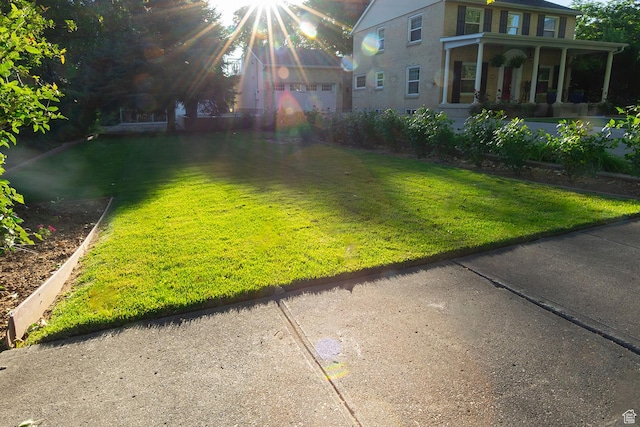 view of yard featuring a porch