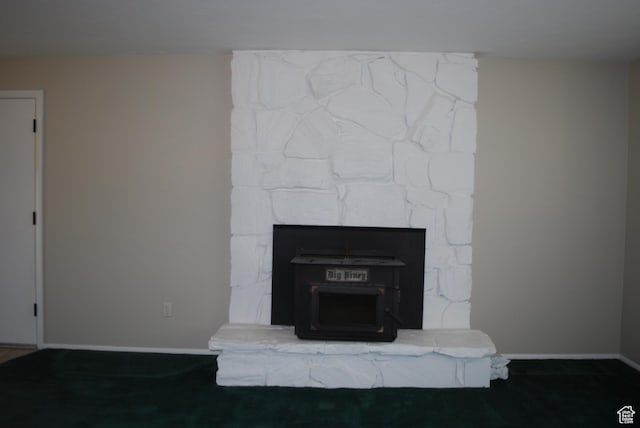 71 Gary Way N, Salt Lake, UT 84054 - detailed view of baseboards and a wood stove