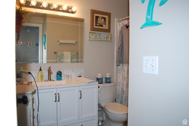 71 Gary Way N, Salt Lake, UT 84054 - bathroom featuring toilet and vanity
