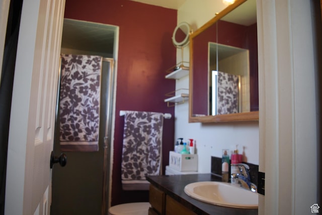 71 Gary Way N, Salt Lake, UT 84054 - bathroom featuring walk in shower, toilet, and vanity