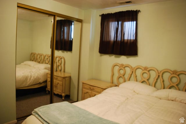 71 Gary Way N, Salt Lake, UT 84054 - carpeted bedroom featuring a closet and visible vents