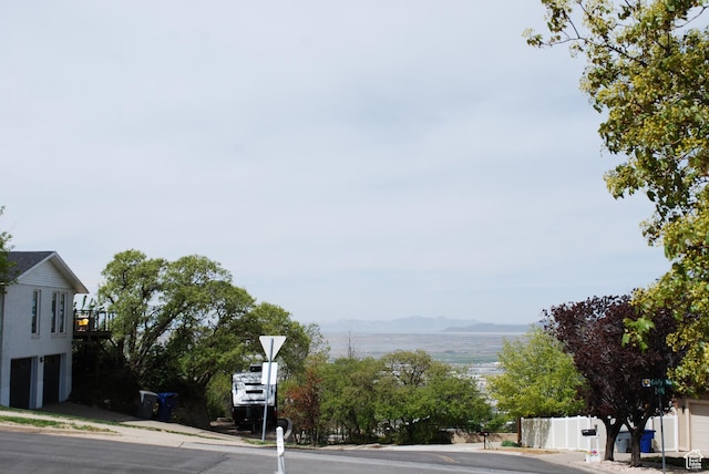71 Gary Way N, Salt Lake, UT 84054 - view of road featuring a mountain view, sidewalks, and curbs