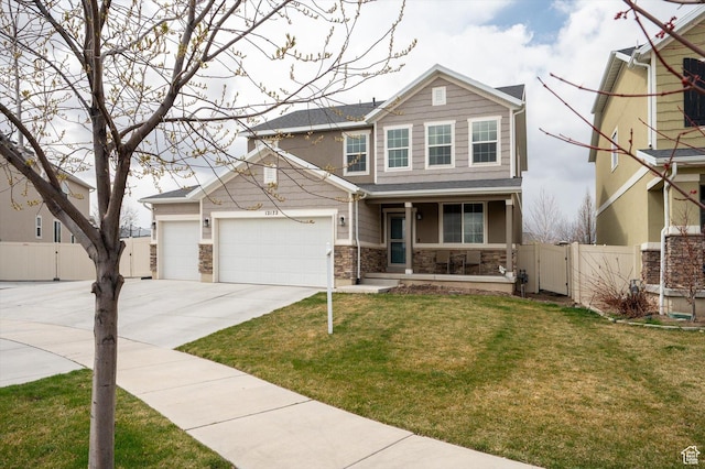 view of front of house featuring a gate, fence, concrete driveway, a front yard, and a porch